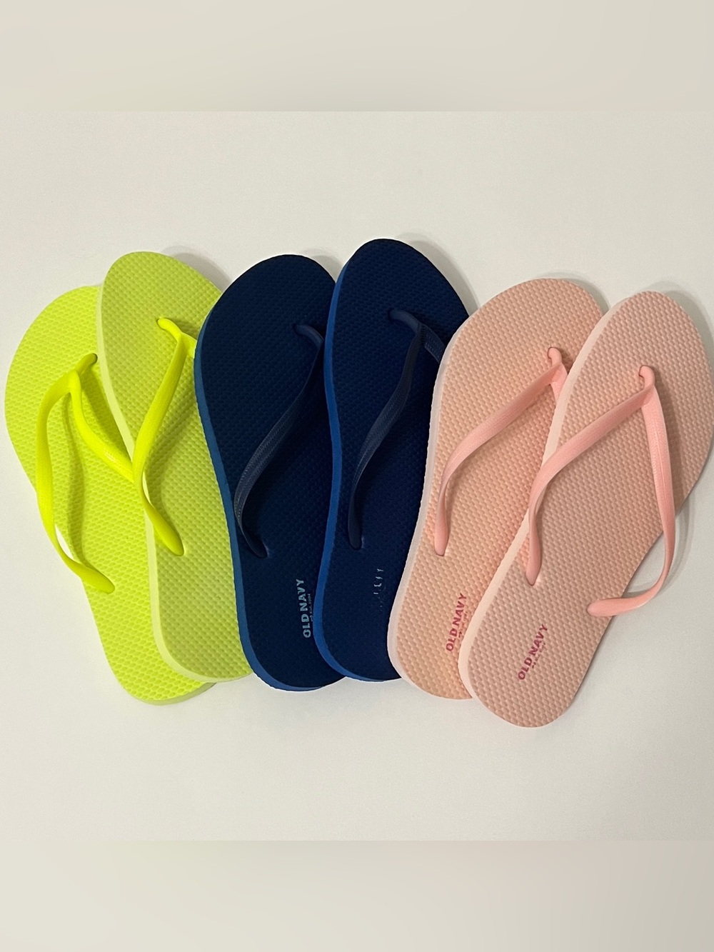 Pale Pink, Royal Blue & Highlighter Yellow
Old Navy Flip Flop Set Size 9/10